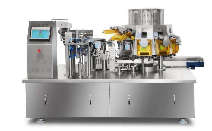 給袋真空包裝機.jpg www.qj-huagong.com